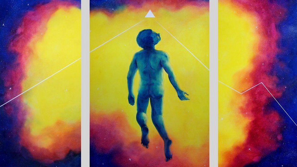 Symbol of the conference - silhouette of a man in multi-colored space.